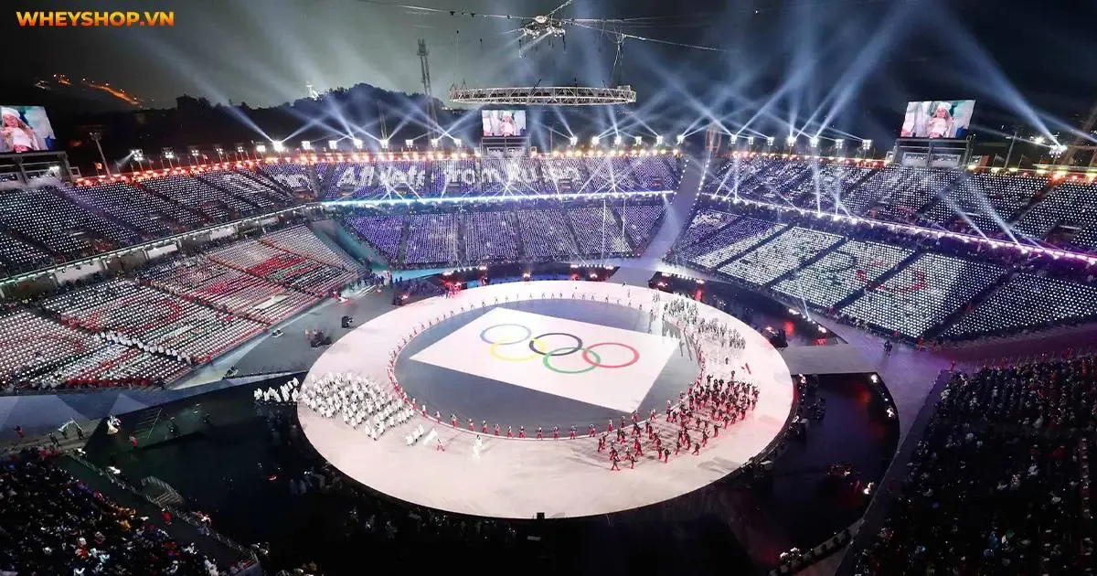 Sự kiện Olympic bóng đá là gì với biểu tượng ngọn đuốc Olympic rực sáng