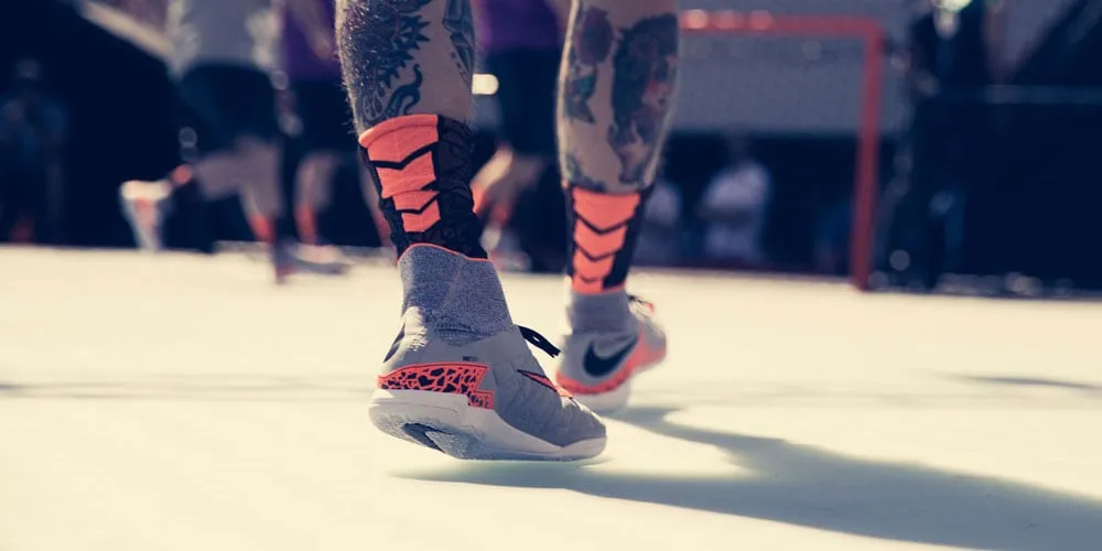 Giày bóng đá IC cải tiến độ bền cho sân futsal ngoài trời và đường phố