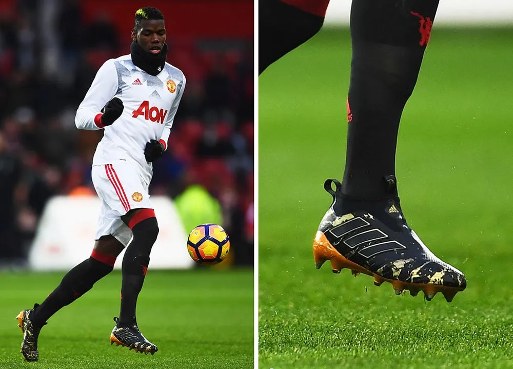 Giày bóng đá đinh SG với đinh dài, đầu kim loại/nhựa, bám chắc trên sân cỏ mềm ở Việt Nam