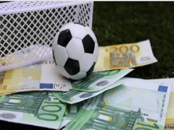 Biểu đồ tài chính sụt giảm mạnh, tượng trưng cho việc mất hết vốn khi chơi tất tay trong cá độ bóng đá.